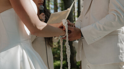 Couple sharing a sweet kiss during their wedding reception in Ontario