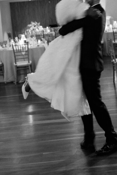 Bride and groom dancing on checkboard dance floor at Glen Foerd Estate in Philadelphia, PA