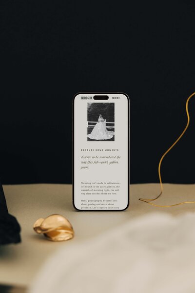 Editorial mobile mockup showcasing a modern Showit website template for wedding photographers who value timeless design and romantic storytelling.