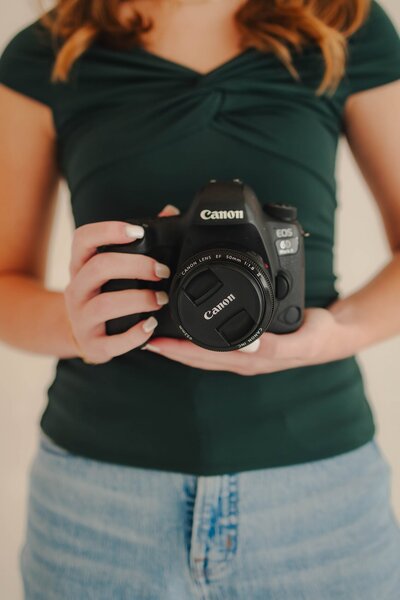 sydney chapman holding her camera