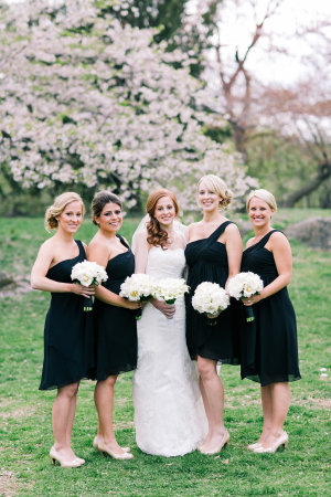 Bridesmaids with bride in Cherry Blossom tree