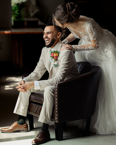 A Bride and groom pose after their first look before their catholic wedding mass at Holy Family Catholic Church in Brentwood, Tennessee.