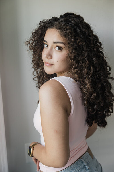 Eris is a hair stylist at Moxie Hair Studio