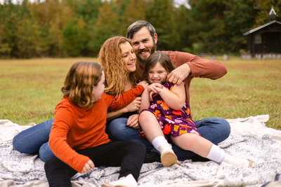 Family photo in fall colors in a field