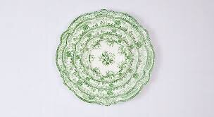 Wedding china in white and green designed for luxury destination weddings in Europe