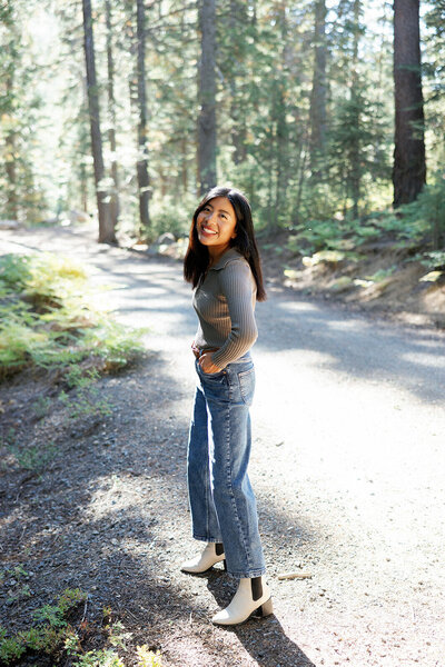 women standing up with her hands on her hips