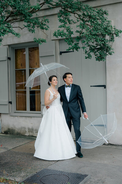 Happy Couple at Outdoor Garden Ceremony Altar Pops of colorful florals and bride with a ruffle dress