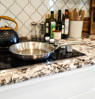 non-toxic cookware stainless steel pan in kitchen on stove. optimal for hormone health