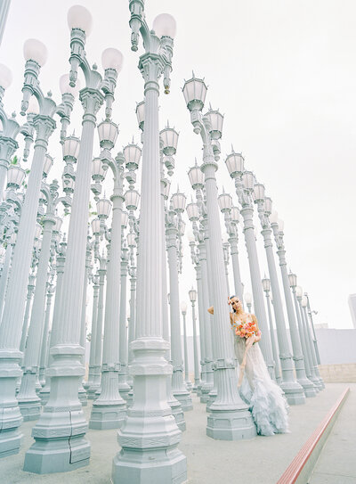 Bridal portraits in downtown Los Angele and Venice Beach with sea green marchesa gown photographed by destination wedding photographer Amy Mulder Photography