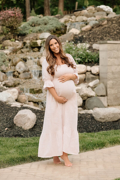 a happy couple enjoying their maternity photos with Diana Ratcliff