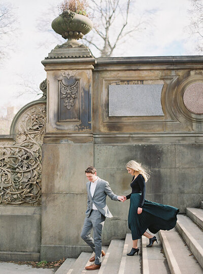 Bride and groom walk up memorial steps at their DC wedding