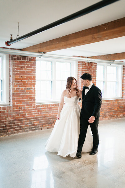 The Venues at the Factory wedding in New Hampshire with industrial modern details and candid moments.