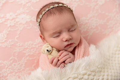 baby sleeping holding teddy by Philadelphia Newborn Photographer