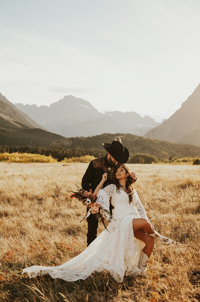 Vintage, western style elopement portrait in Glacier National Park