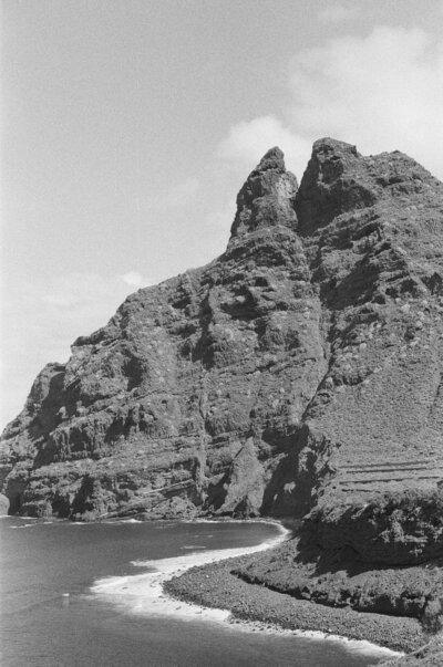 black and white film photo of a mountain on the coast in Punto del Hidalgo, Canary Islands