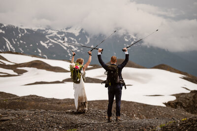 Bride & Groom celebrating Alaskan wedding after long hike