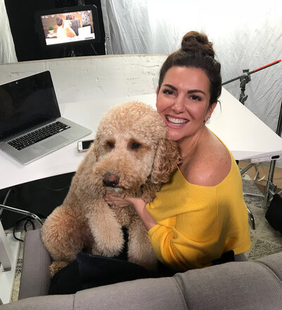 Amy working with Scout in lap - Online Marketing Expert
