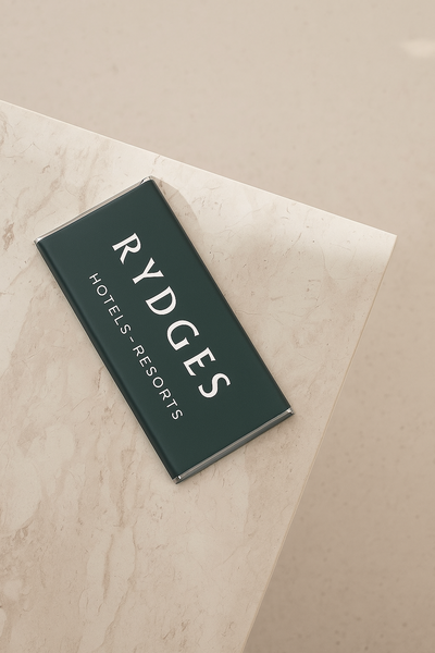 Luxury personalised chocolate bar in deep green Rydges Hotel Sydney design, created by Barilliant for premium guest gifting.