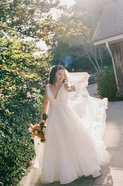 film photo of bride and groom exchanging vows at classy luxury wedding ceremony at Crane Estate in Ipswich, Massachusetts