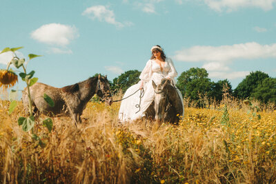 Bride and Groom sharing a laugh on their wedding day. Captured by Wedding Videographer in the UK, HC VIsuals.