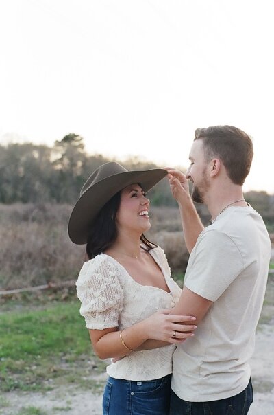 Man kisses woman on the cheek