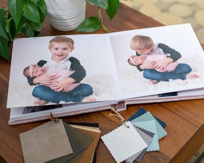 Newborn and Sibling photography in album