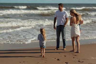family on beach for lifestyle photos