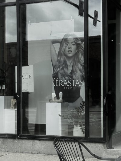 Storefront of Anthology Salon- a luxury salon in Downtown Neenah, Wisconsin specializing in blonding and hair extensions