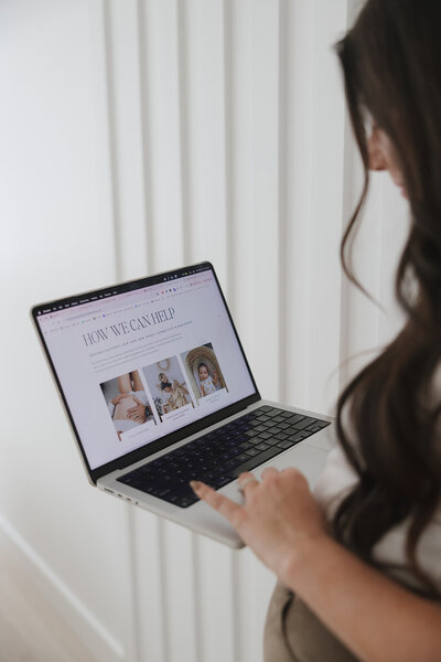 Danielle browsing on laptop