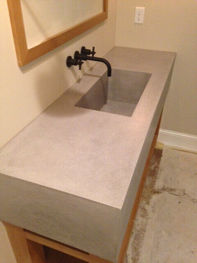 Concrete trough sink in pool house