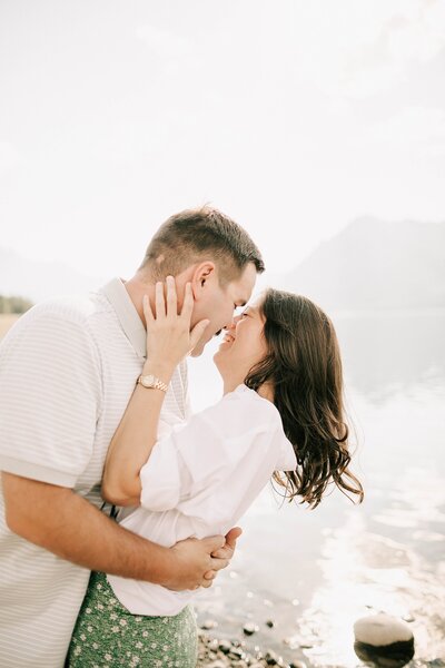 engaged couple standing together during engagement session in southern utah taken by adrian wayment photo