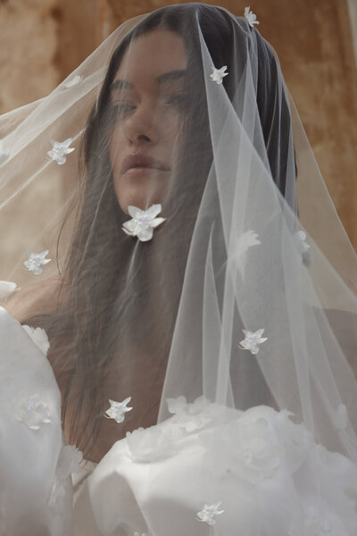 brides face with floral veil