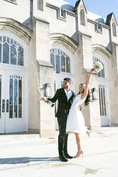 a couple cheering at The Broadway by Kelly Jo Photographer