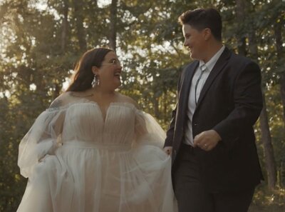 newlyweds walk in forest