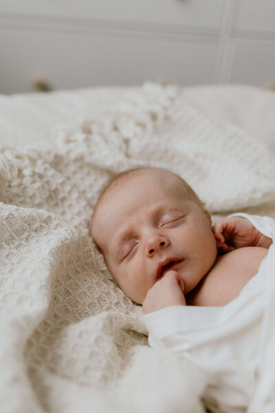 Photo of a newborn baby sleeping