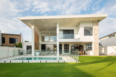 The Marisol home’s outdoor living area, complete with a designer pool, alfresco lounge, and seamless indoor-outdoor flow.