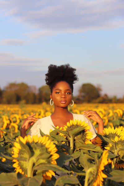 woman in sunflower field