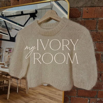 Logo design on top of image of knitted jumper