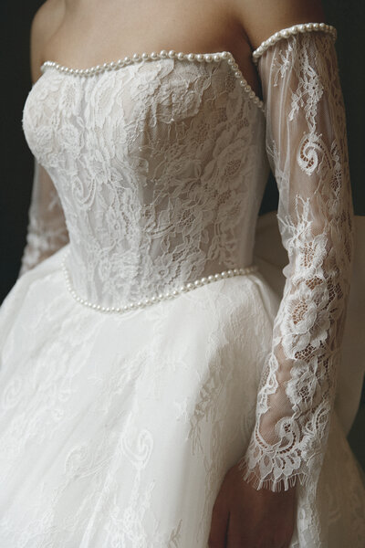 bride and groom holding hands