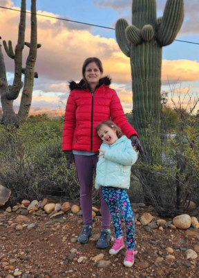 Wahls Protocol Success Stories Jill standing with her daughter in a desert