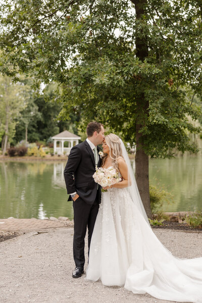 Bride and groom walking hand in hand, radiating joy and love as they begin their journey together on their wedding day in Columbus, OH.