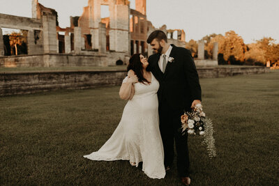 Bride and Groom walk away from the ruins after they eloped on Cumberland island Georgia