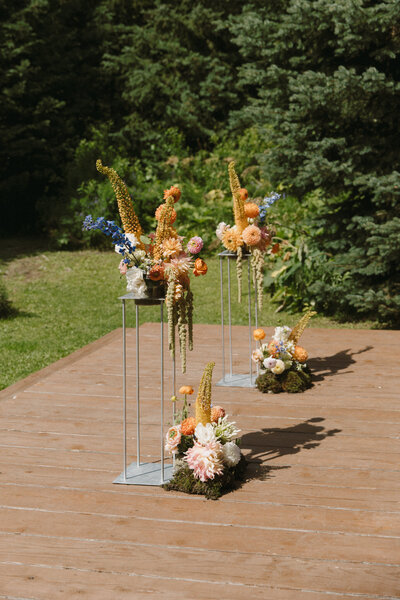 real wedding in edmonton alberta, floral ceremony arch piece photo