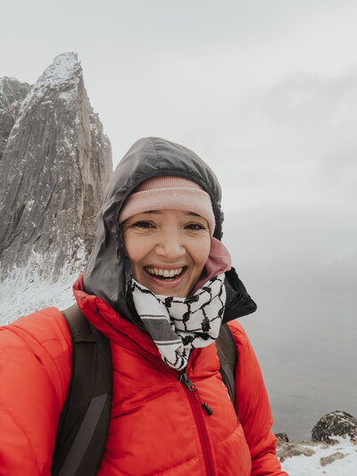 Woman with wind in her hair smiling