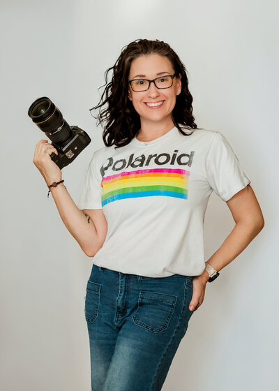 kara michelle holding camera headshot newborn maternity family photographer by york lancaster baltimore photographer