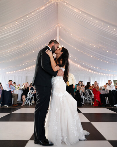 The bride and groom sharing their first dance during their Saratoga National Golf Course Wedding.