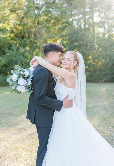 Laughter-filled candid shot of bride and groom.