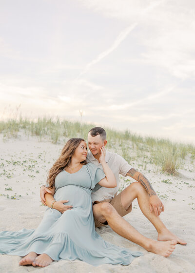Professional Beach maternity portrait, taken  by Emily DeLuke Photography in Wrightsville Beach, NC