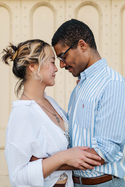Engaged couple hugs during their engagement session