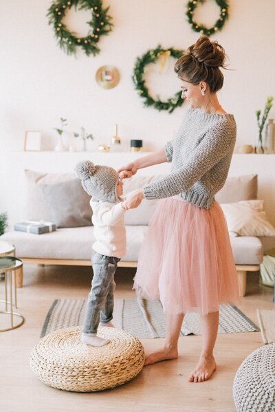 Mother daughter dancing playing dress up